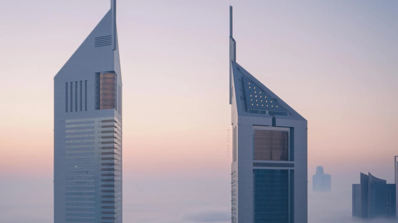 Two rising towers in the Dubai's skyline.